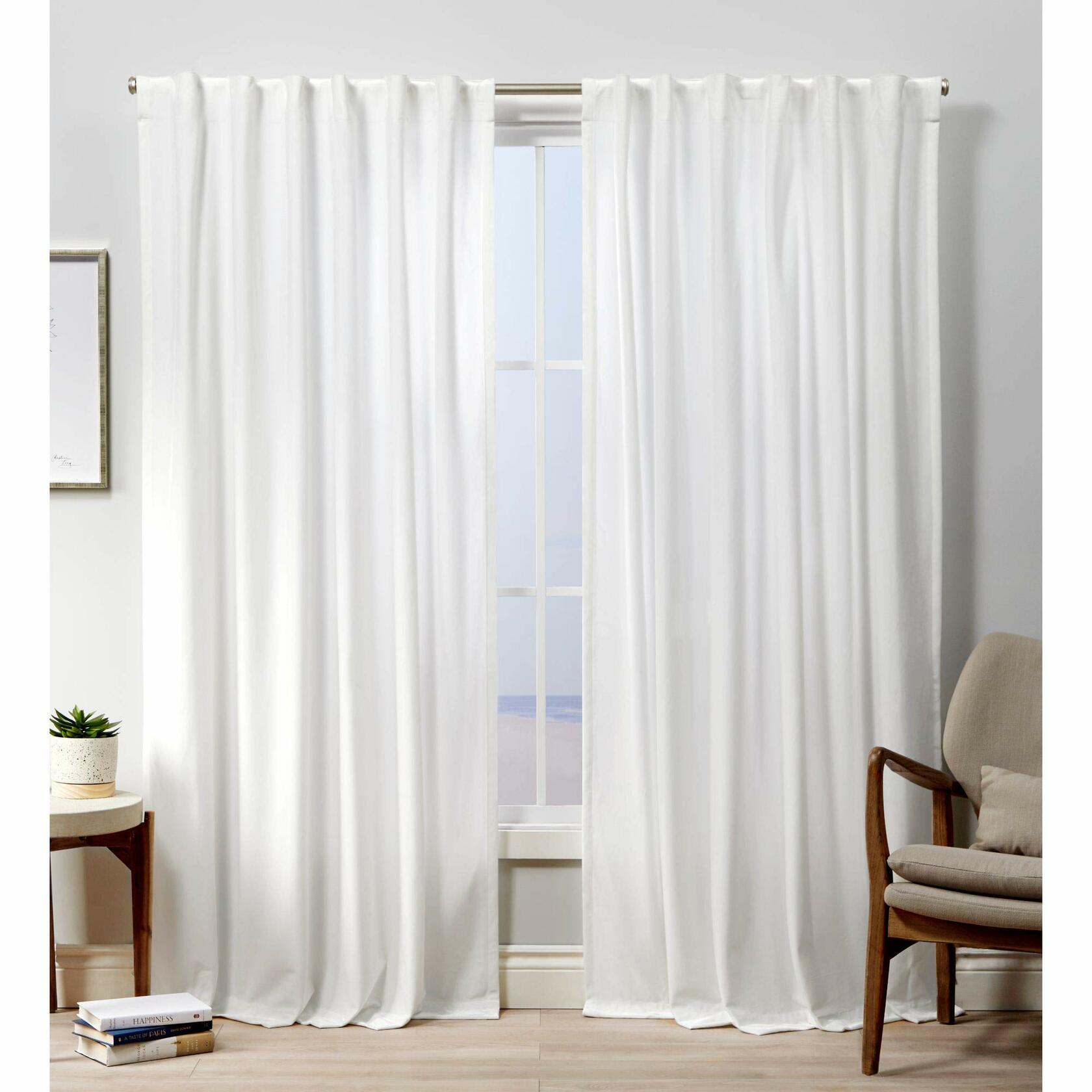 Exclusive Home Curtains Velvet Heavyweight Light Filtering Hidden Tab Top Curtain Panel Pair, 52"x84", Winter White