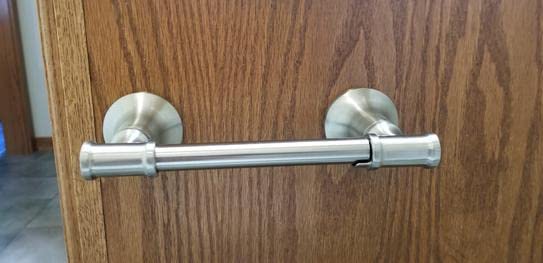 Delta Chamberlain Pivot Arm Toilet Paper Holder in SpotShield Brushed Nickel