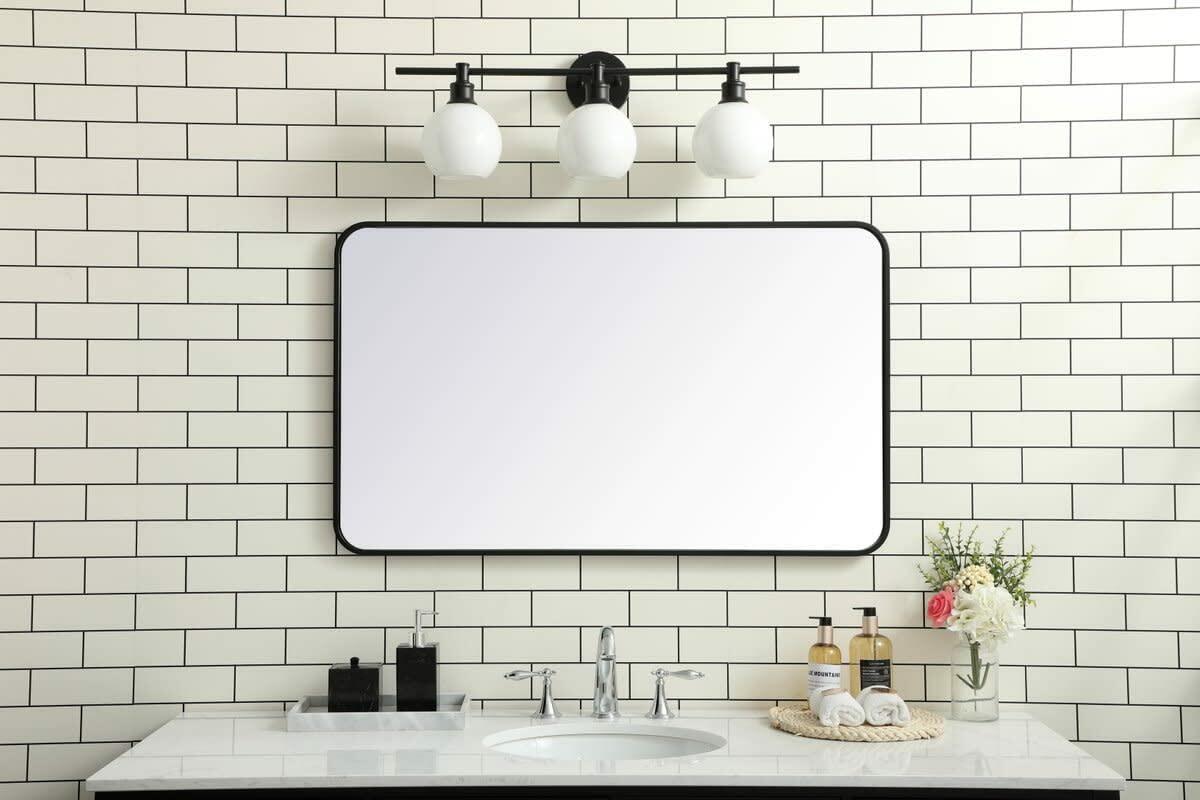 Elegant Decor Evermore 24x40 Soft Corner Metal Rectangular Mirror in Brass